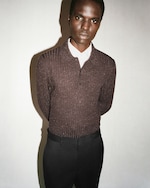 Placeholder for: man wearing brown polo shirt