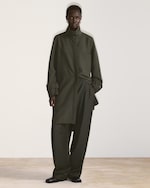 Placeholder for: woman in dark jacket