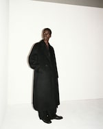 Placeholder for: man wearing long coat