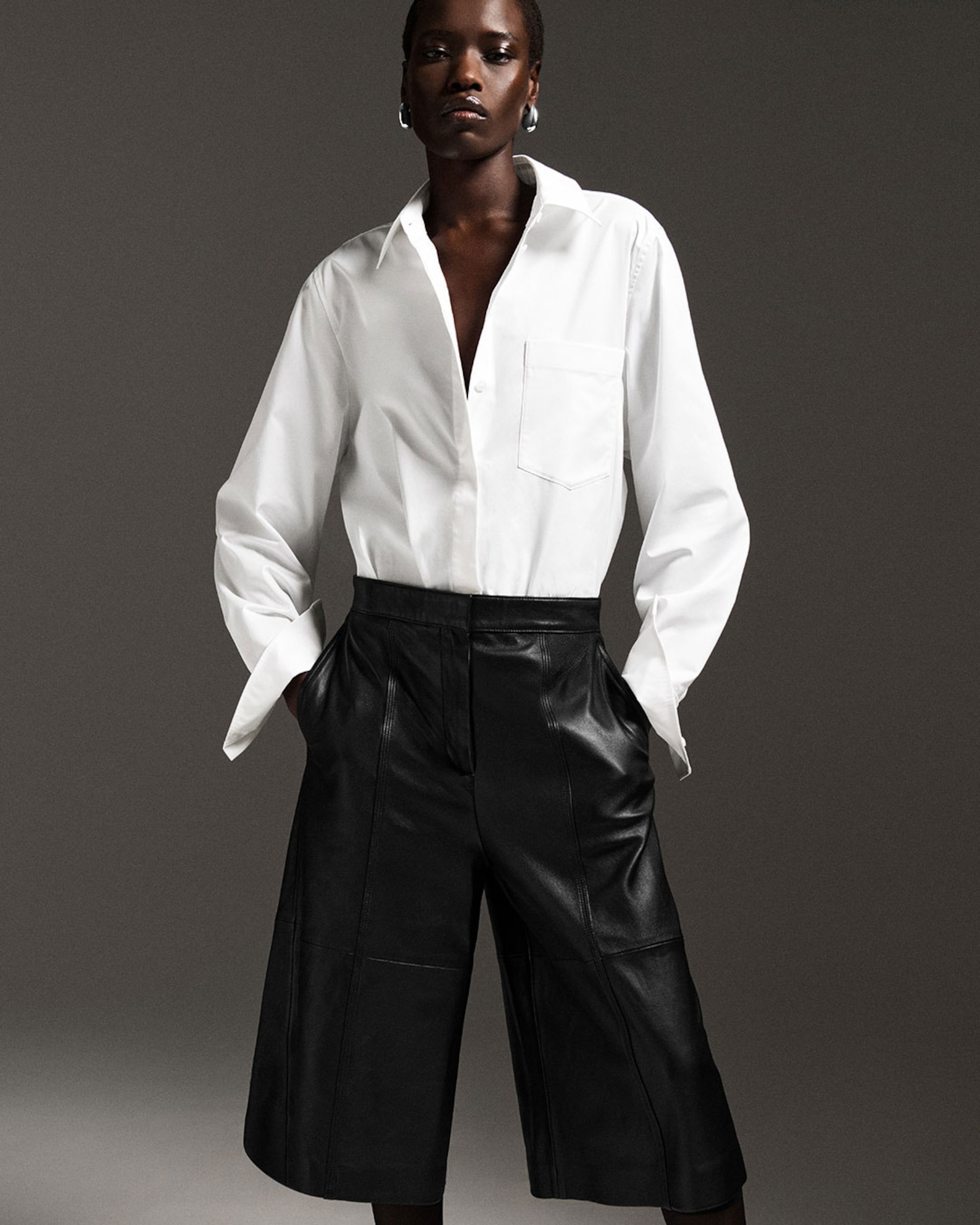 woman in leather culottes