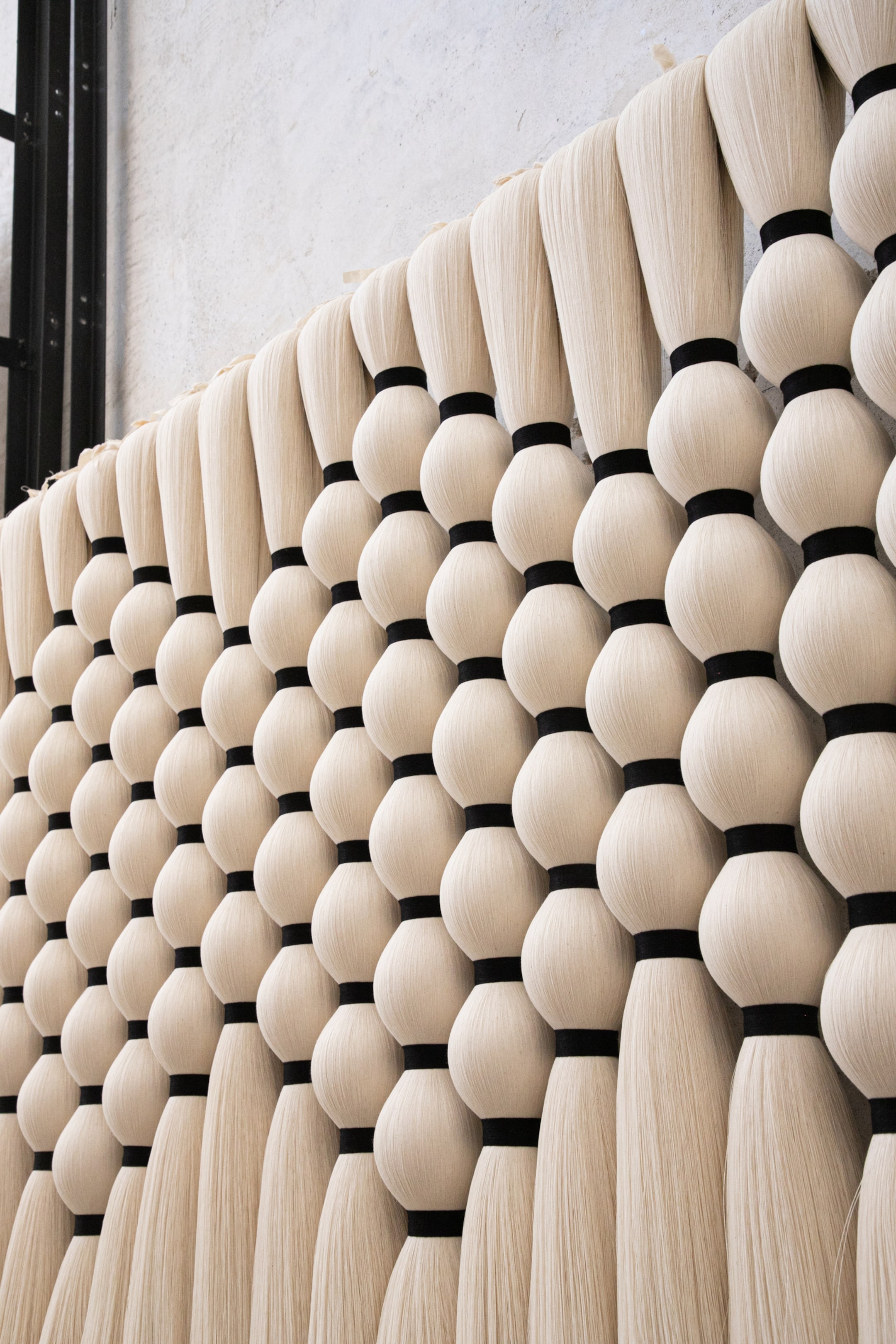 art installation hanging on wall