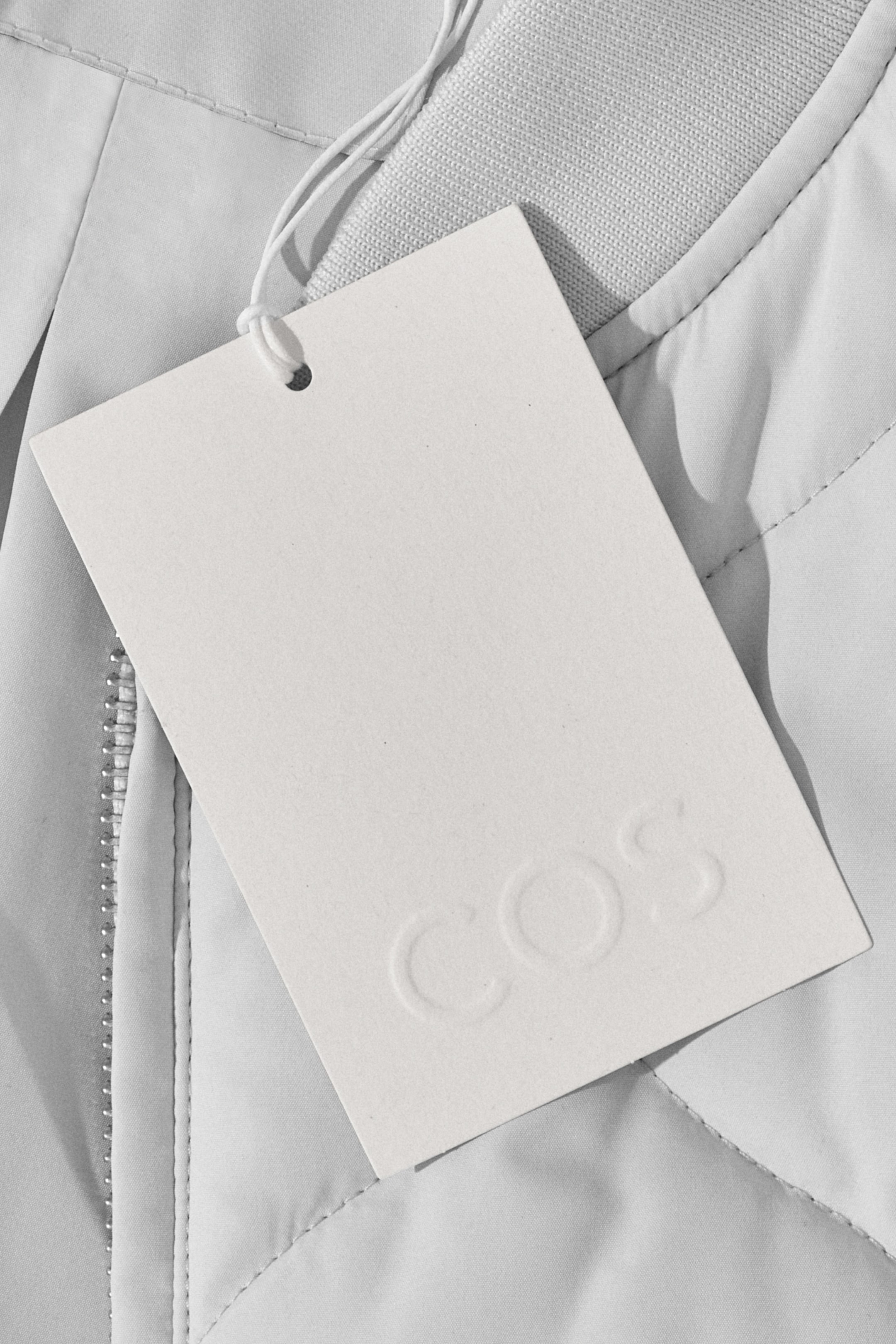 COS clothing tag