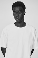 Placeholder for: Man wearing white tshirt