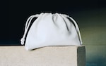 Placeholder for: leather bag in white