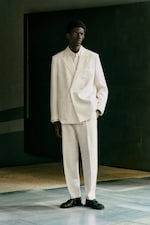Placeholder for: Man wearing white linen suit