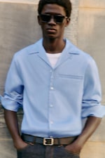 Placeholder for: Man wearing blue shirt