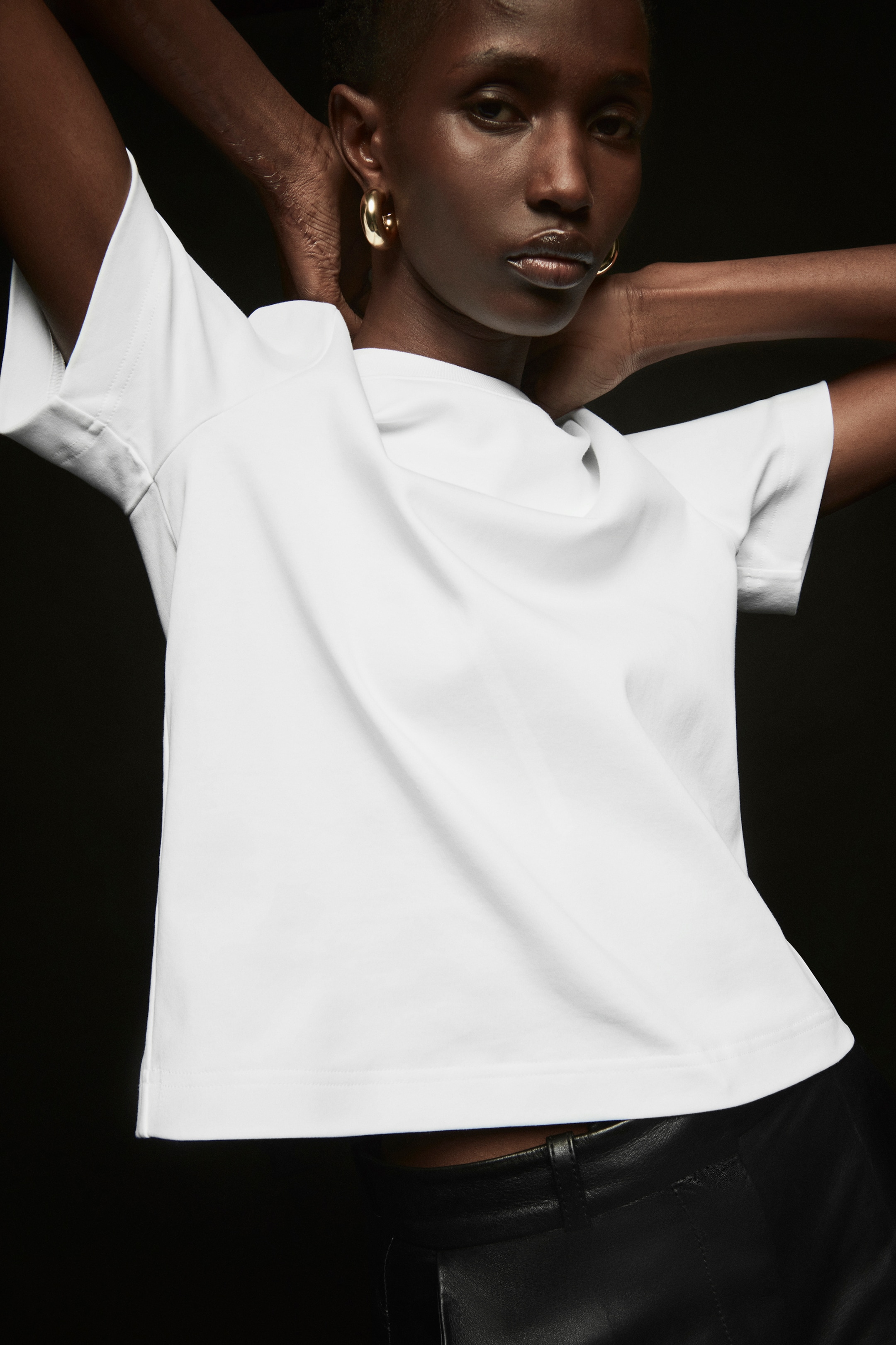 Woman wearing white tshirt