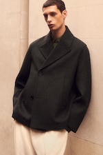 Placeholder for: Man in peacoat