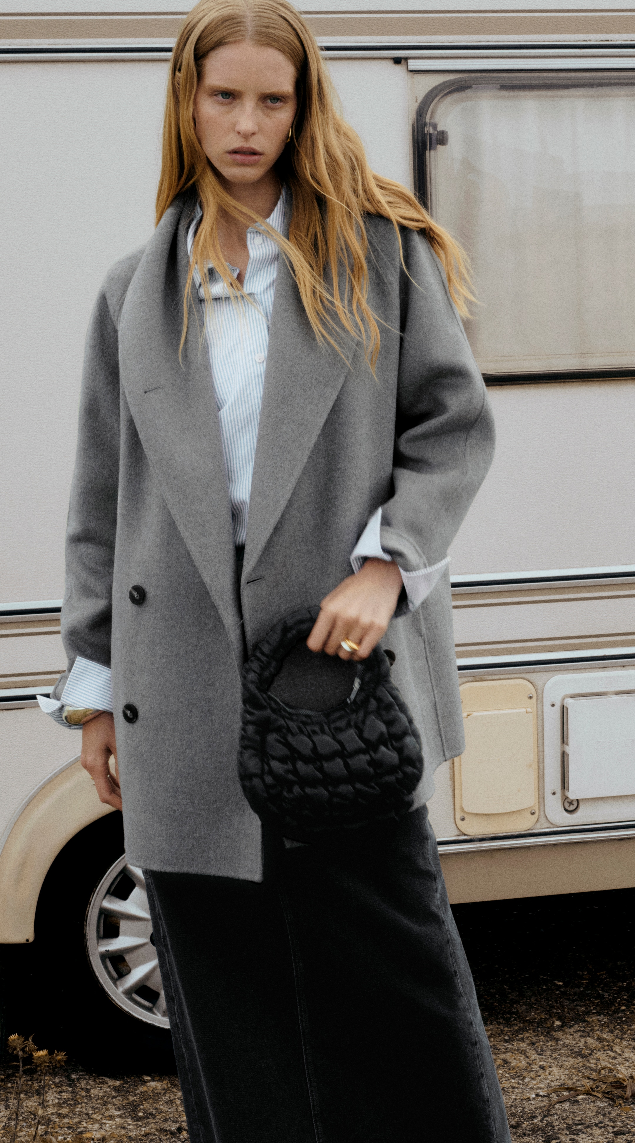 Woman wearing grey wool coat