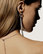 Placeholder for: person wearing earring and necklace