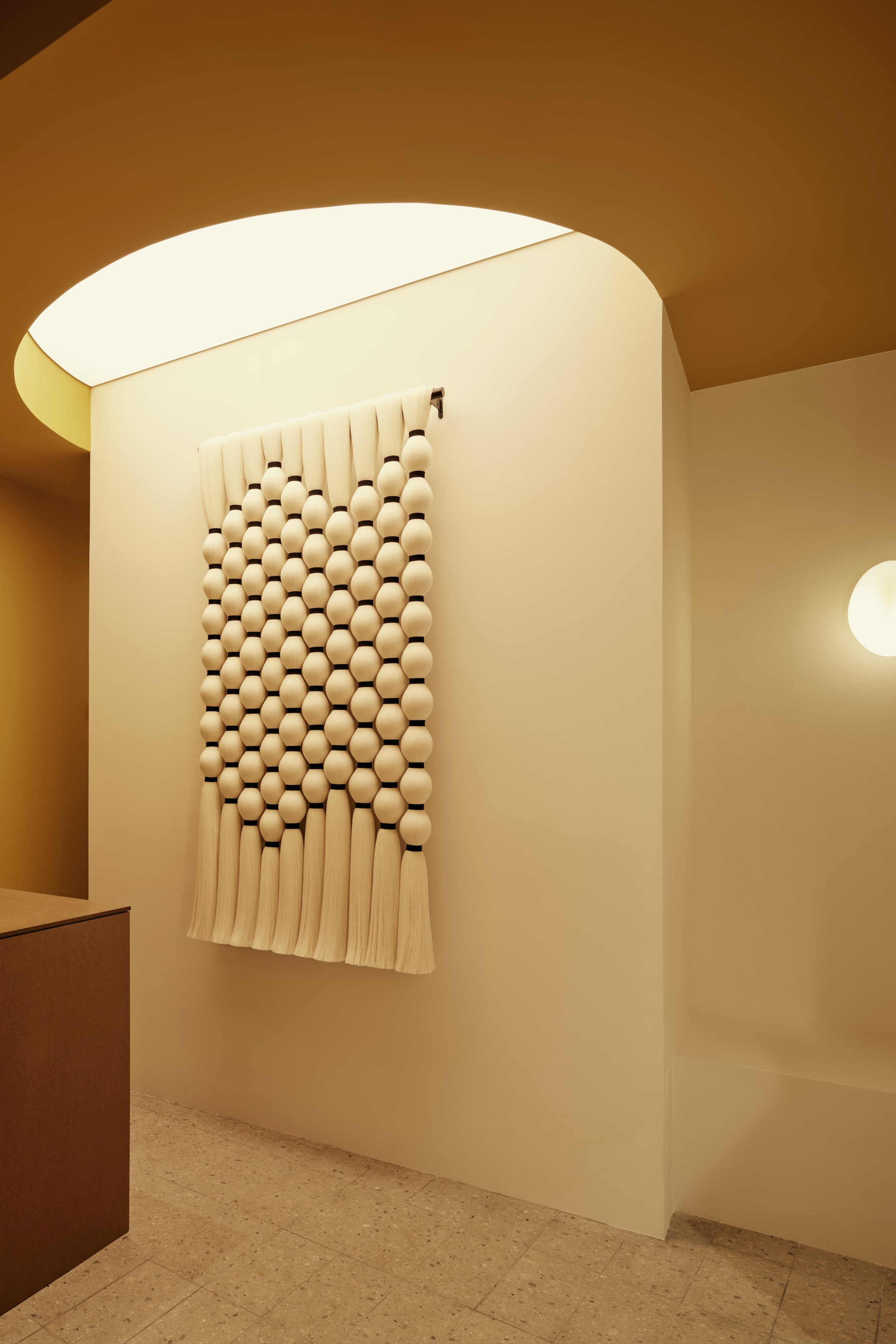 art installation hanging on wall