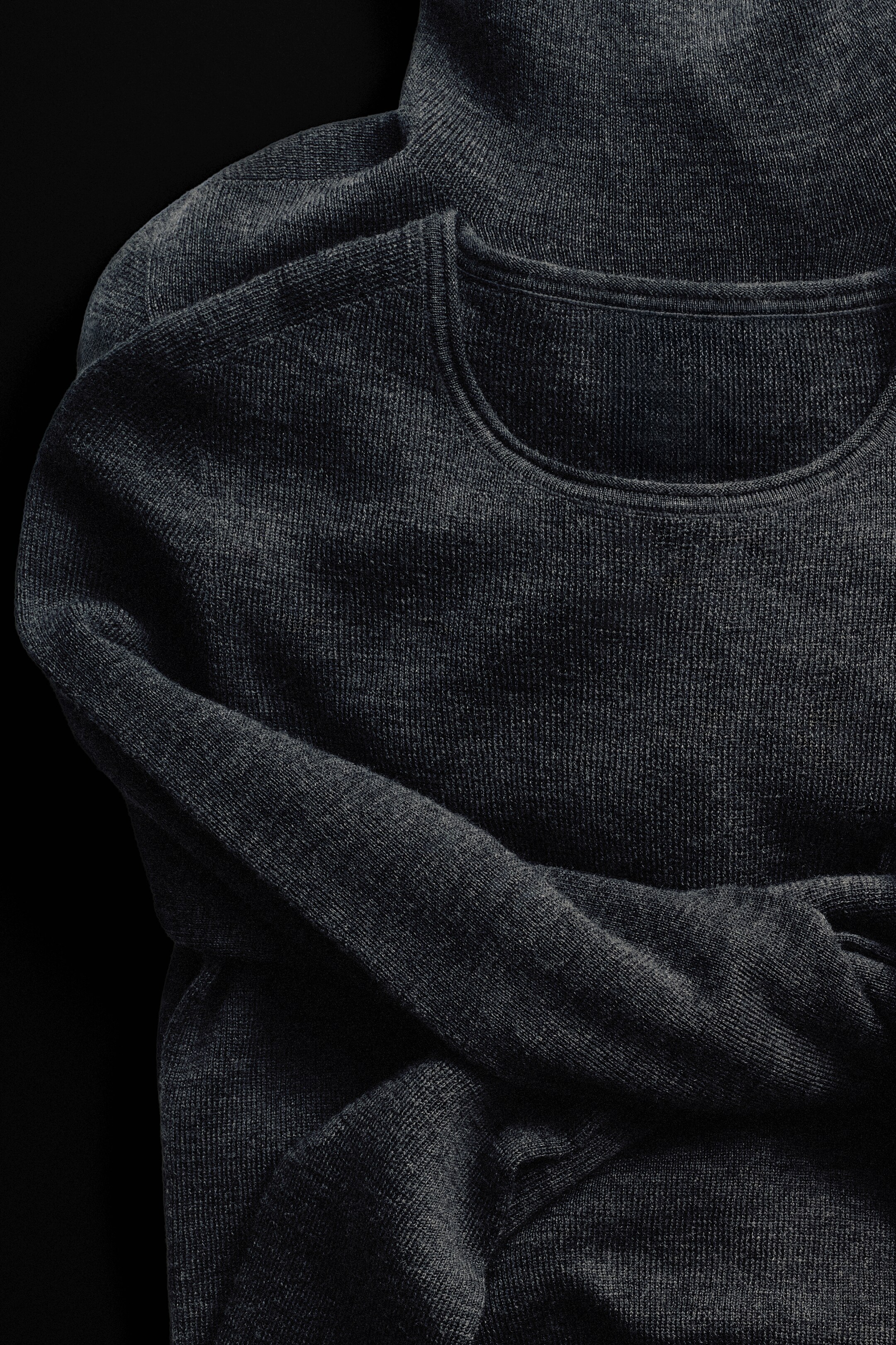 Merino wool shirt on a black background