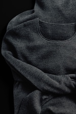 Placeholder for: Merino wool shirt on a black background
