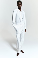 Placeholder for: person wearing white linen set