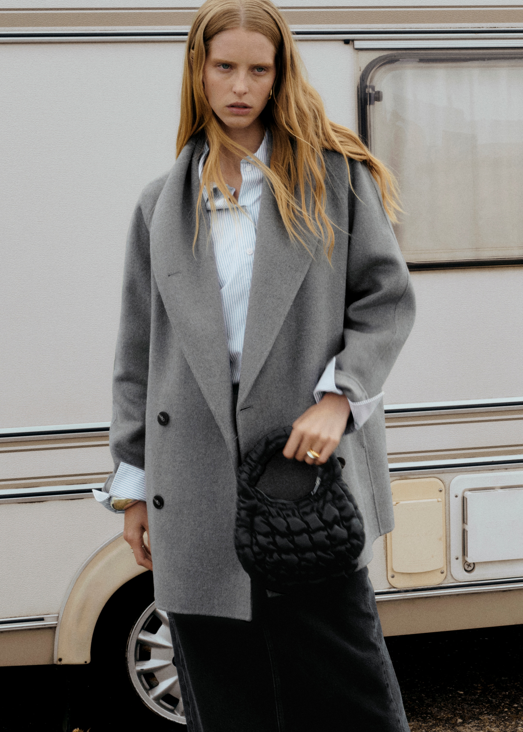 Woman wearing grey wool coat