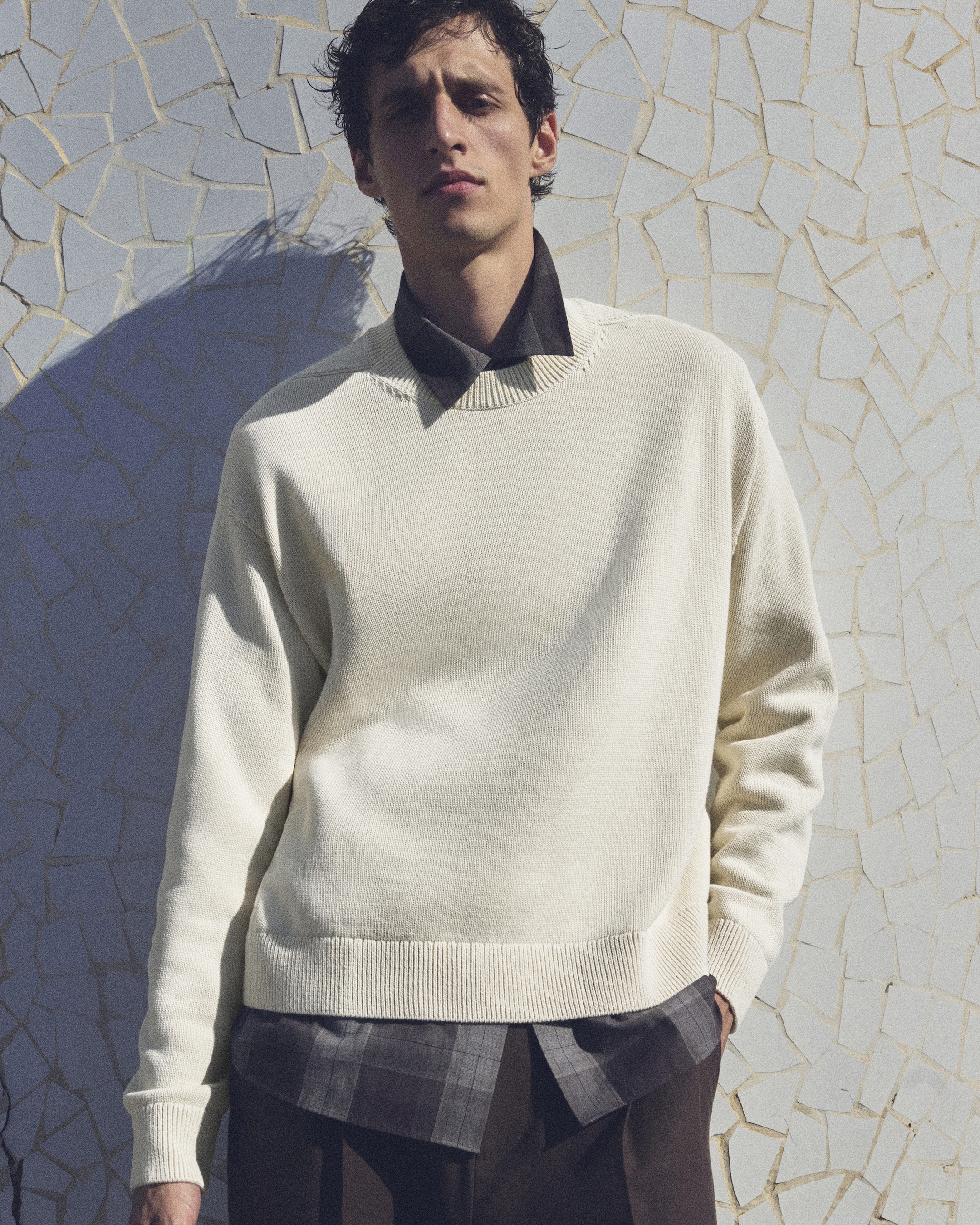 Man in a mustard yellow shirt