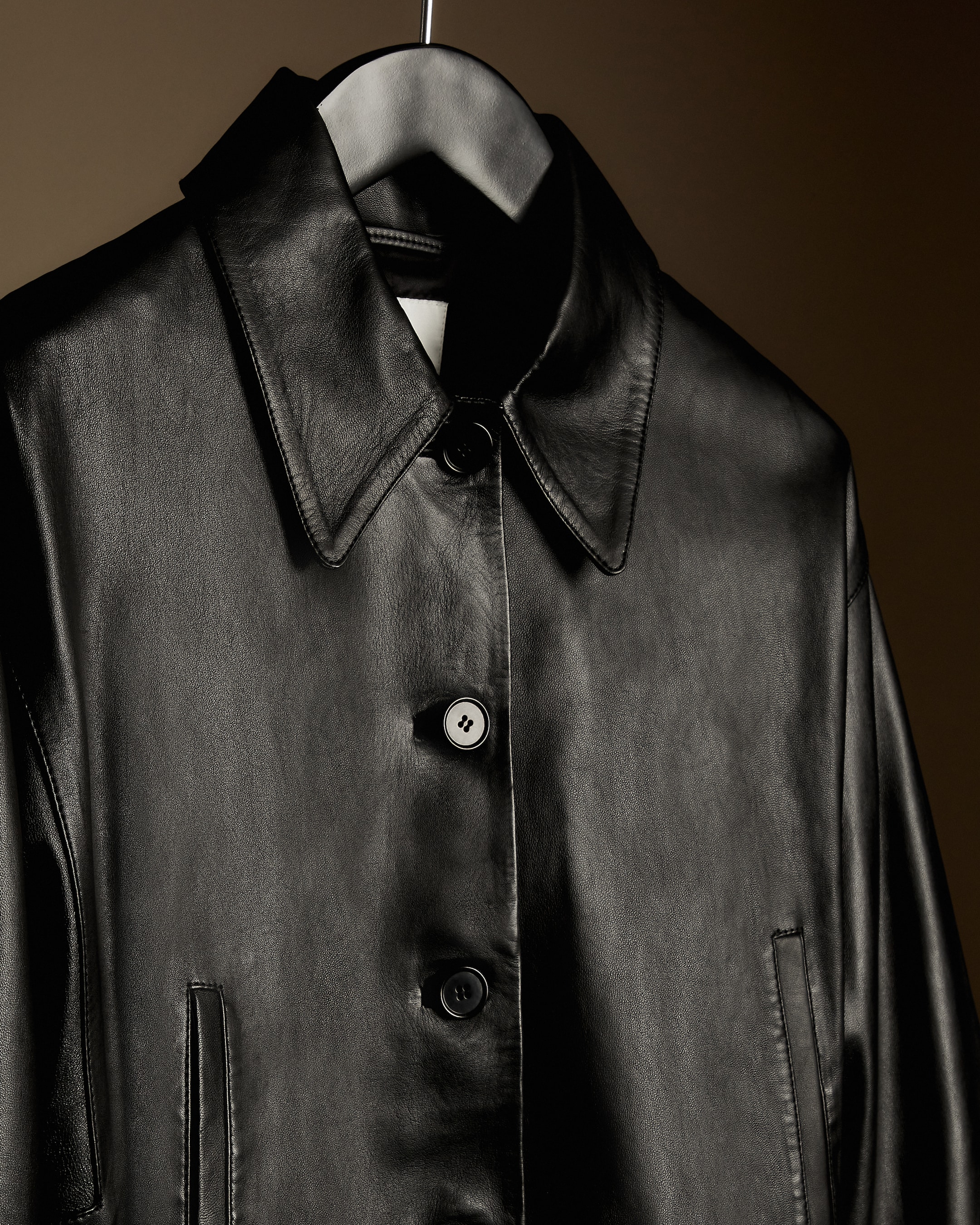 Close up of black leather jacket