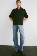 Placeholder for: Black Shirts and Blue Jeans