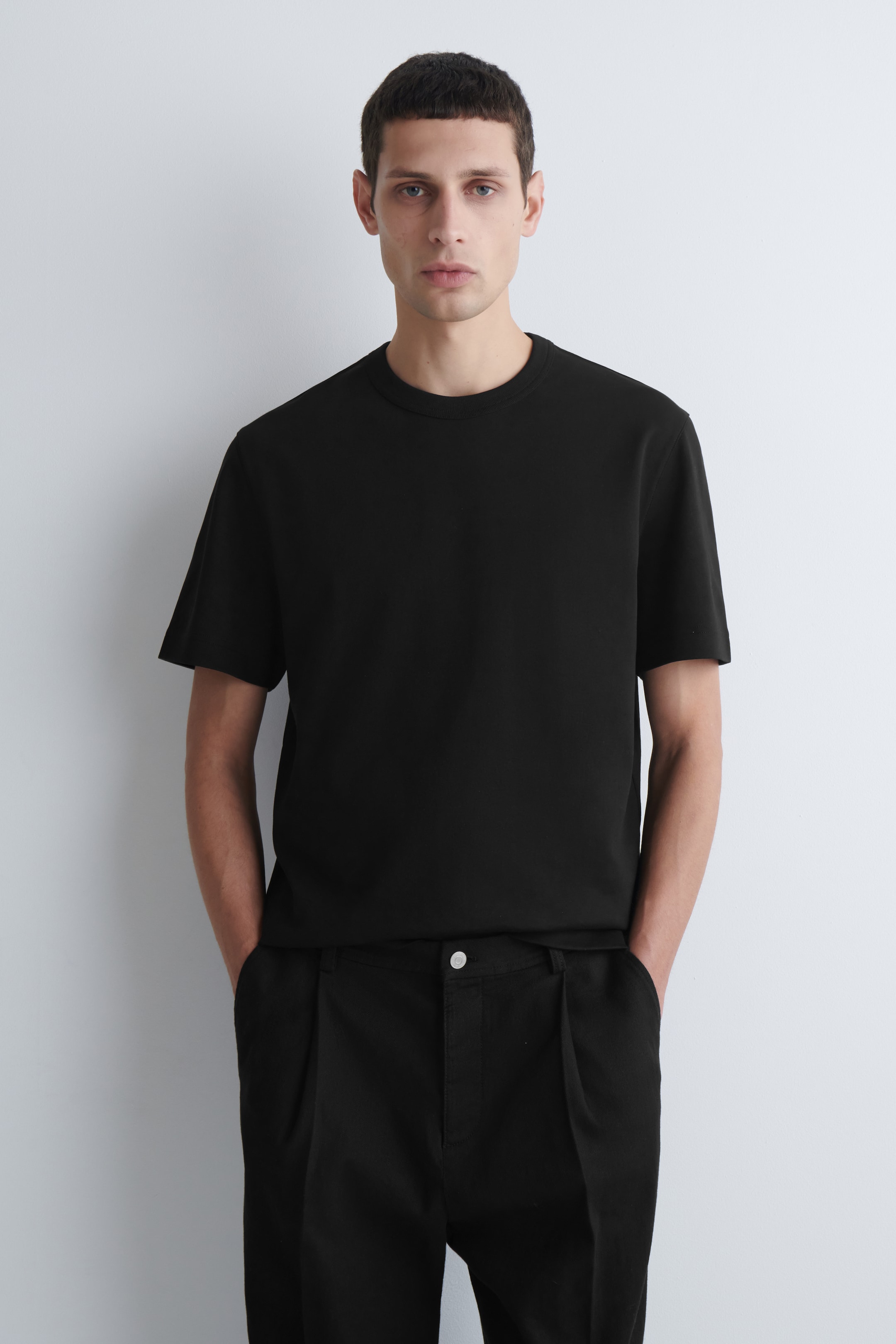 MAN IN BLACK  SHORT SLEEVE TSHIRT