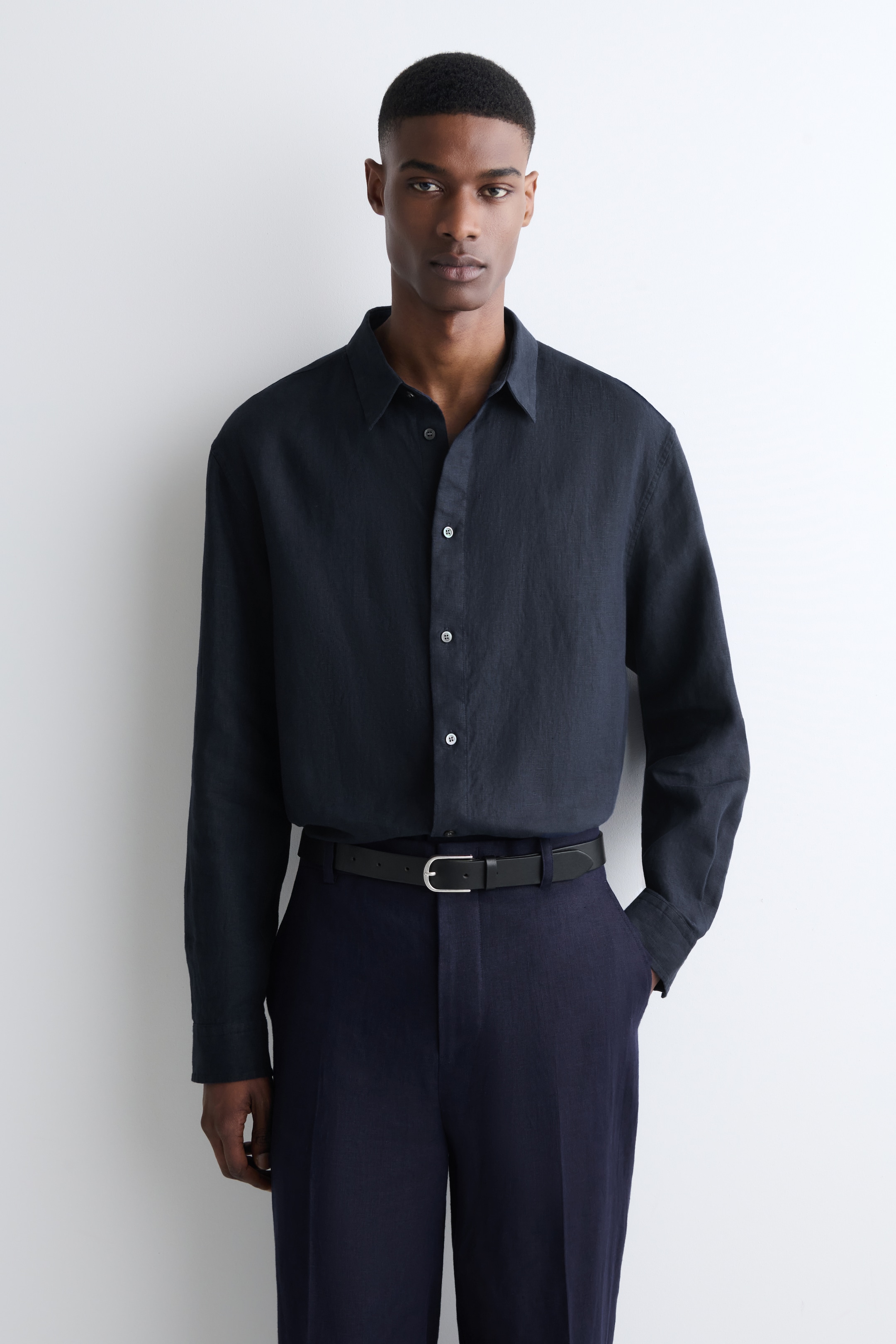 man in navy shirt