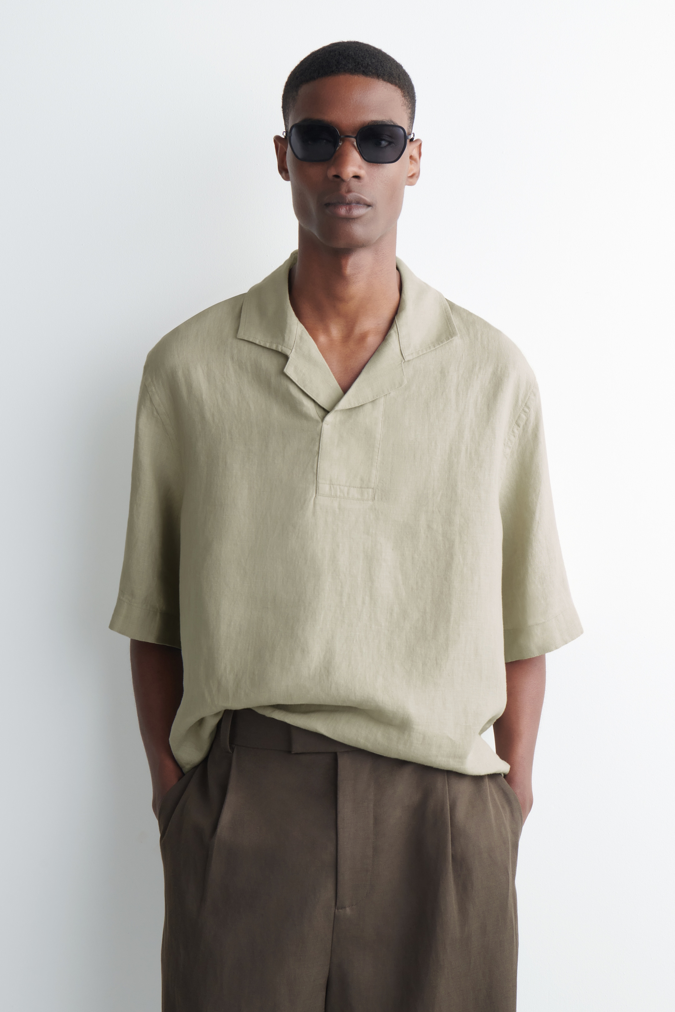 man in pull over casual shirt linen