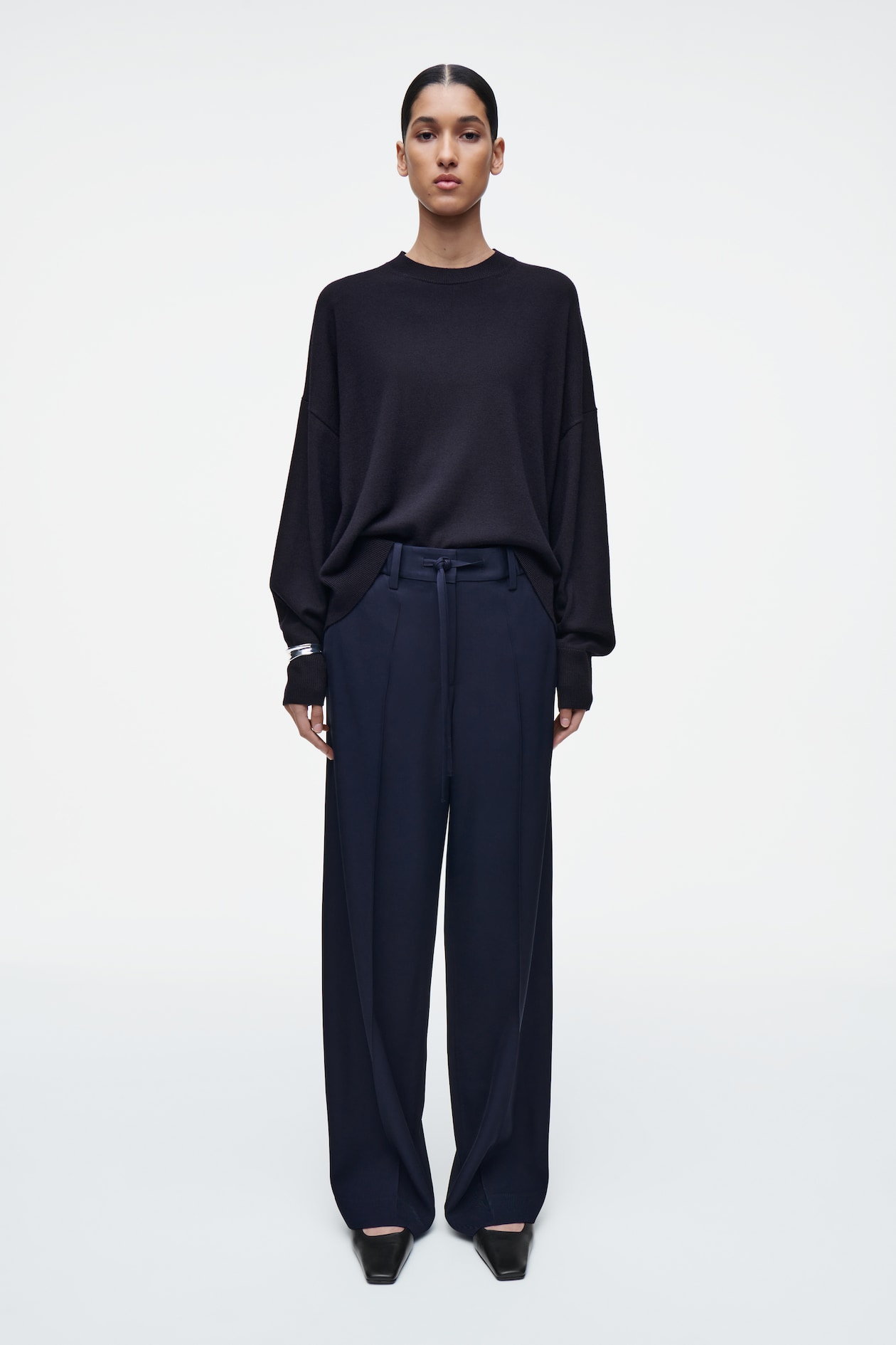 person wearing blue trousers