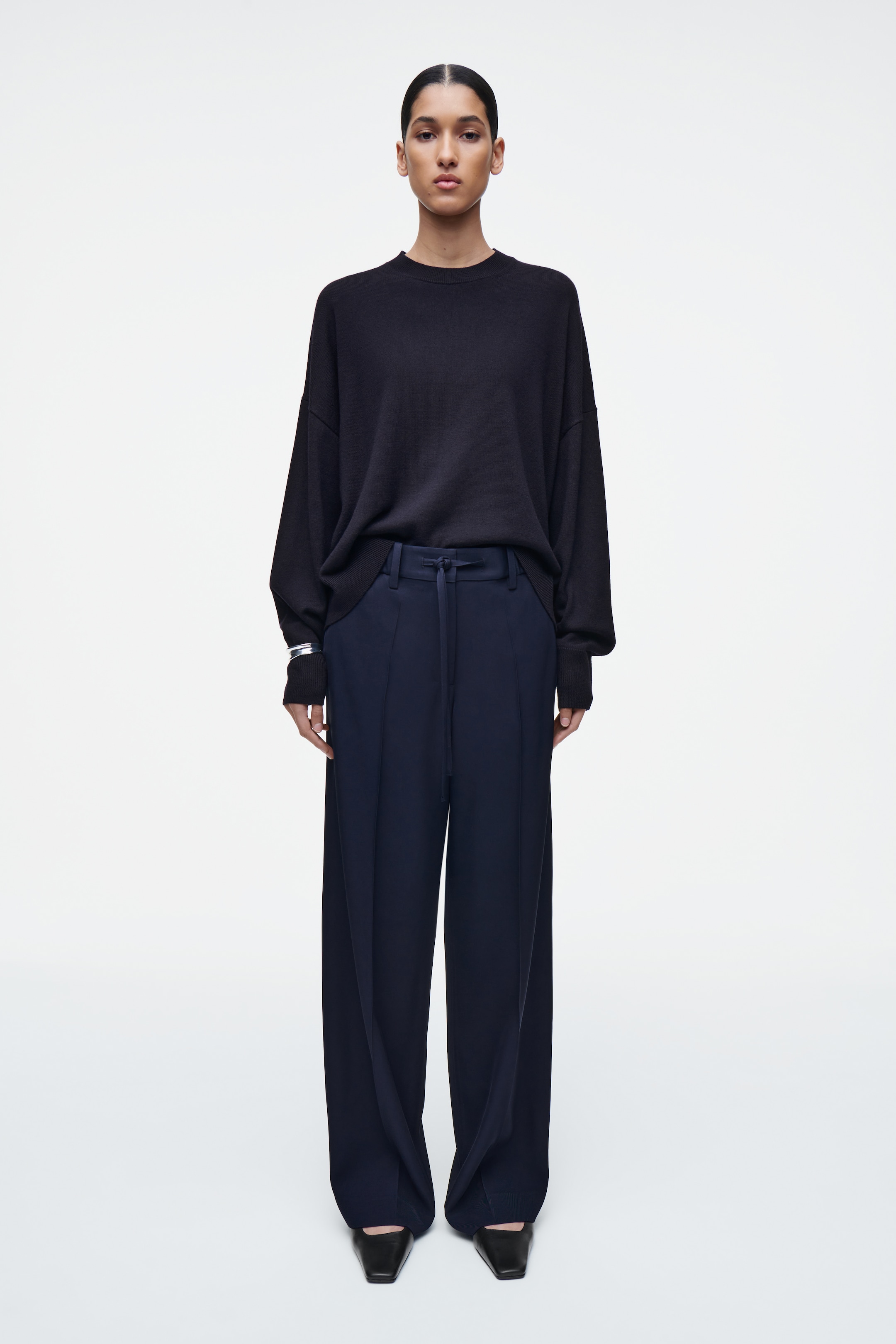 person wearing blue trousers