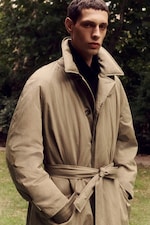 Placeholder for: man in trench style puffer