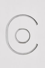 Placeholder for: Charcoal sketch of a large open C shape encircling a smaller imperfect ring on a white background.