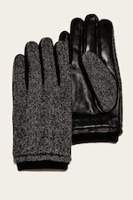 Placeholder for: Pair of black gloves: one herringbone wool top, one smooth leather palm with matching herringbone thumb patch, on a light background.