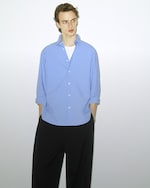 Placeholder for: Man in blue shirt