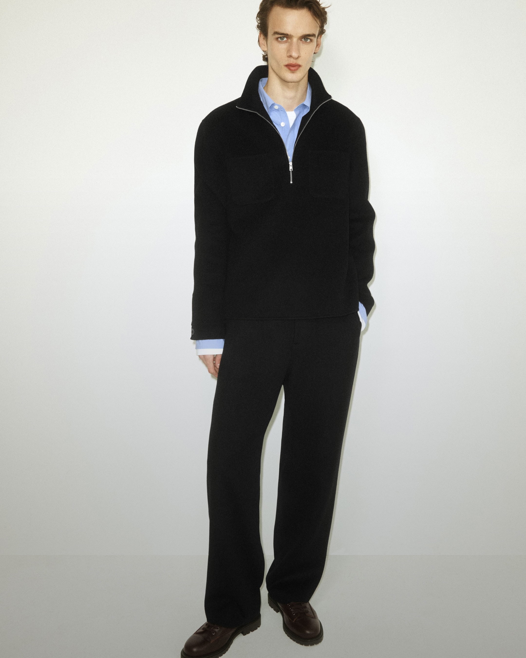 Man in jacket and blue