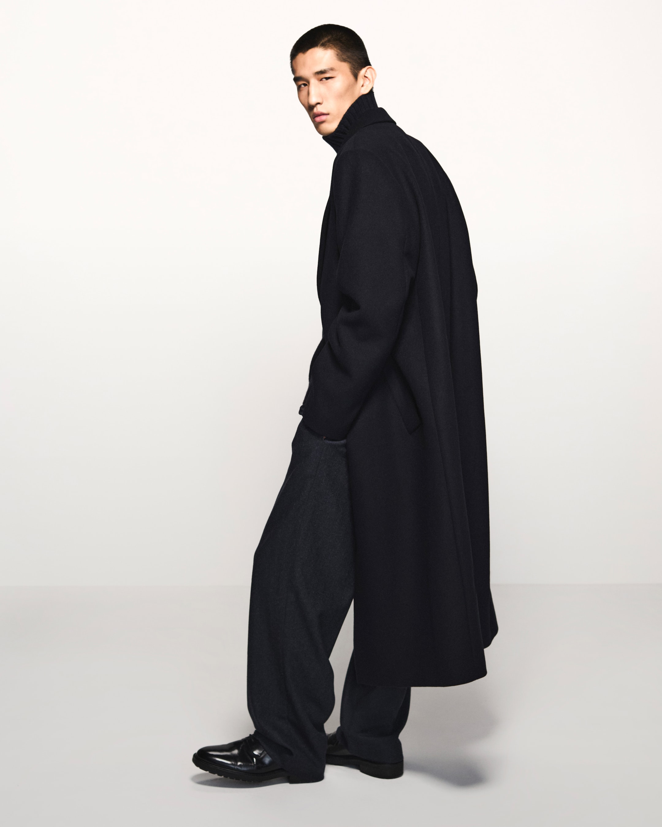 Man in black jacket and shoes and jacket desktop