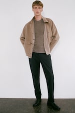 Placeholder for: Mens brown jacket and grey top and black jeans