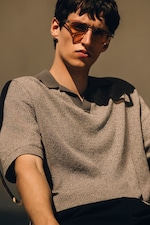 Placeholder for: cropped photo of a man in sunglasses and knit polo shirt
