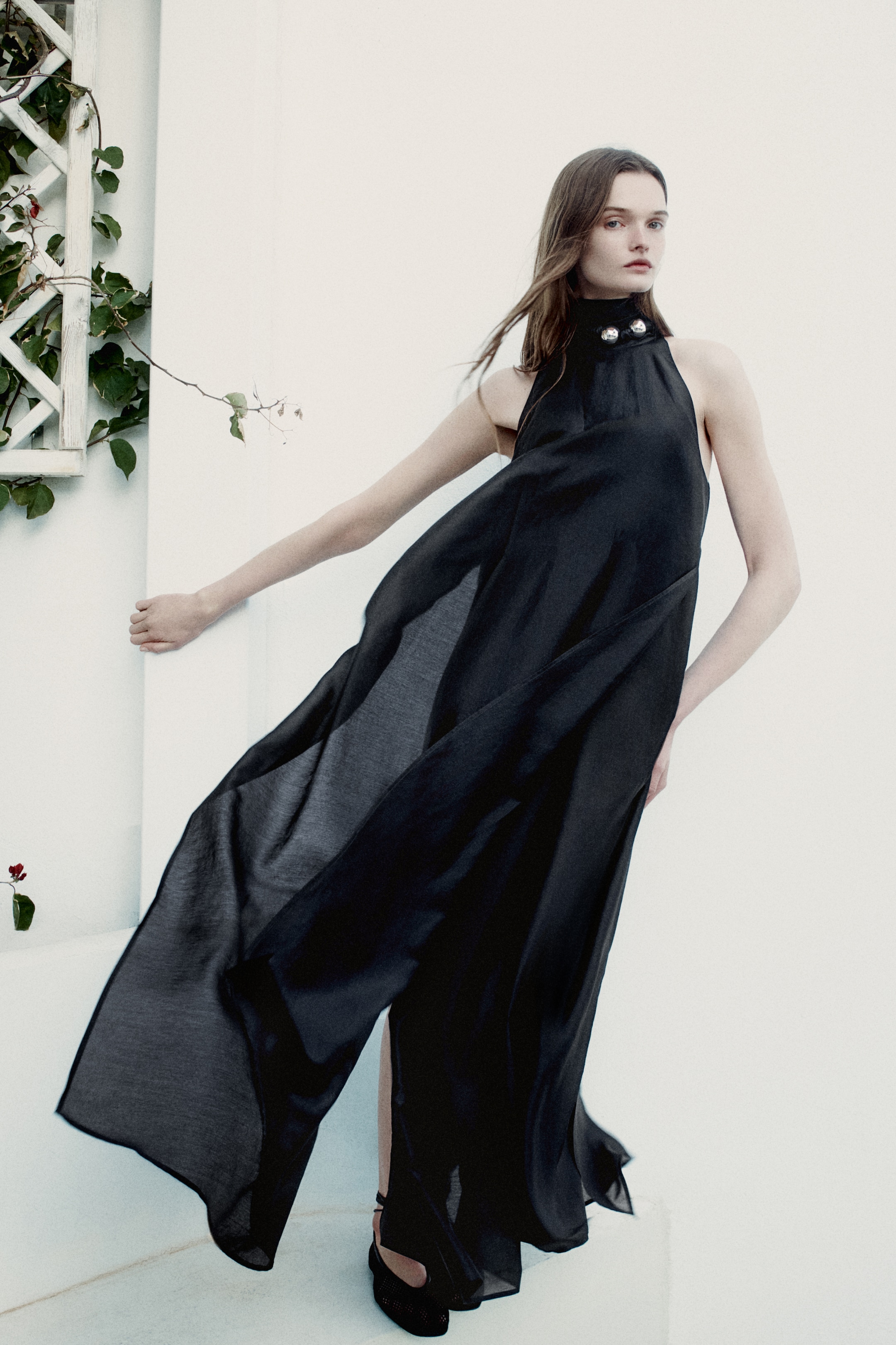 Person wearing black dress