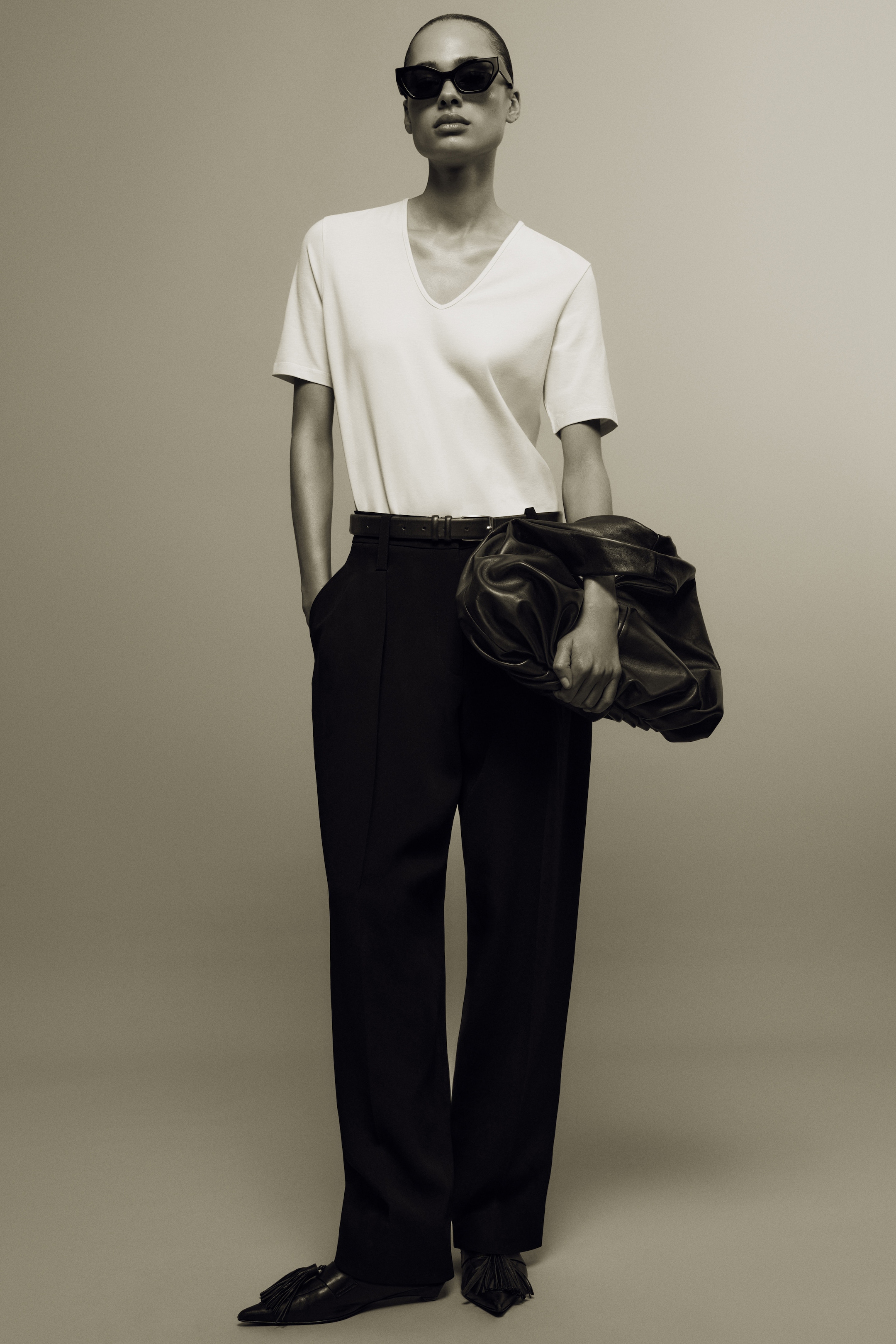 Person wearing white t-shirt