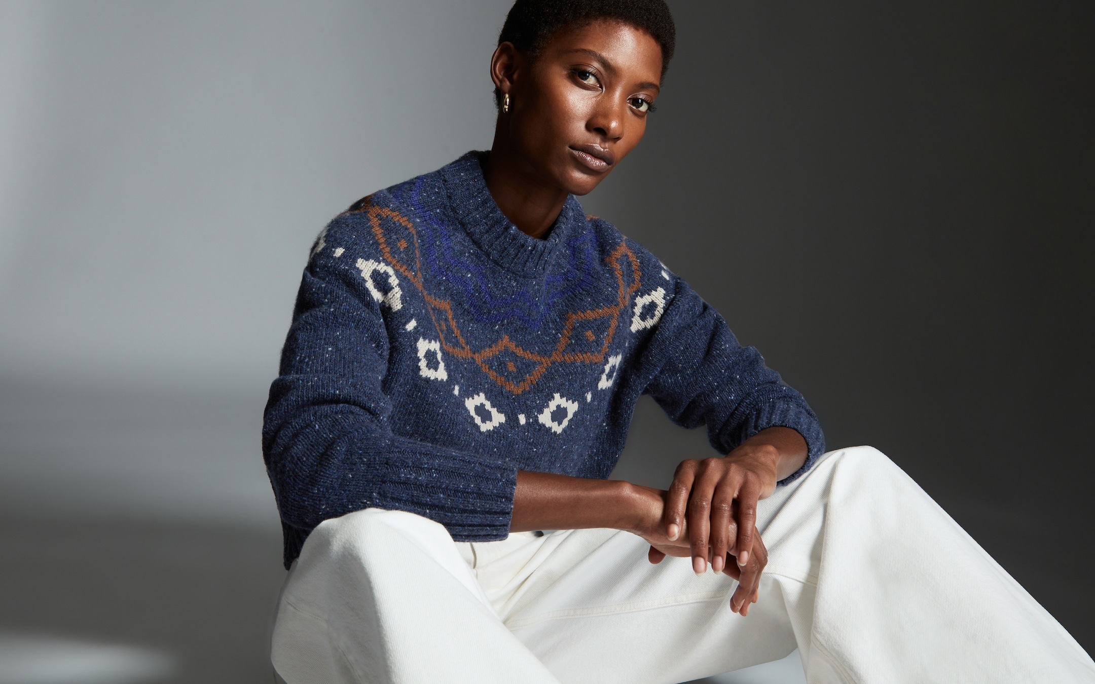 person wearing knitwear