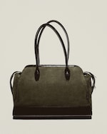 Placeholder for: A stylish olive green handbag with black leather handles and accents, featuring a structured design and a zipper closure.