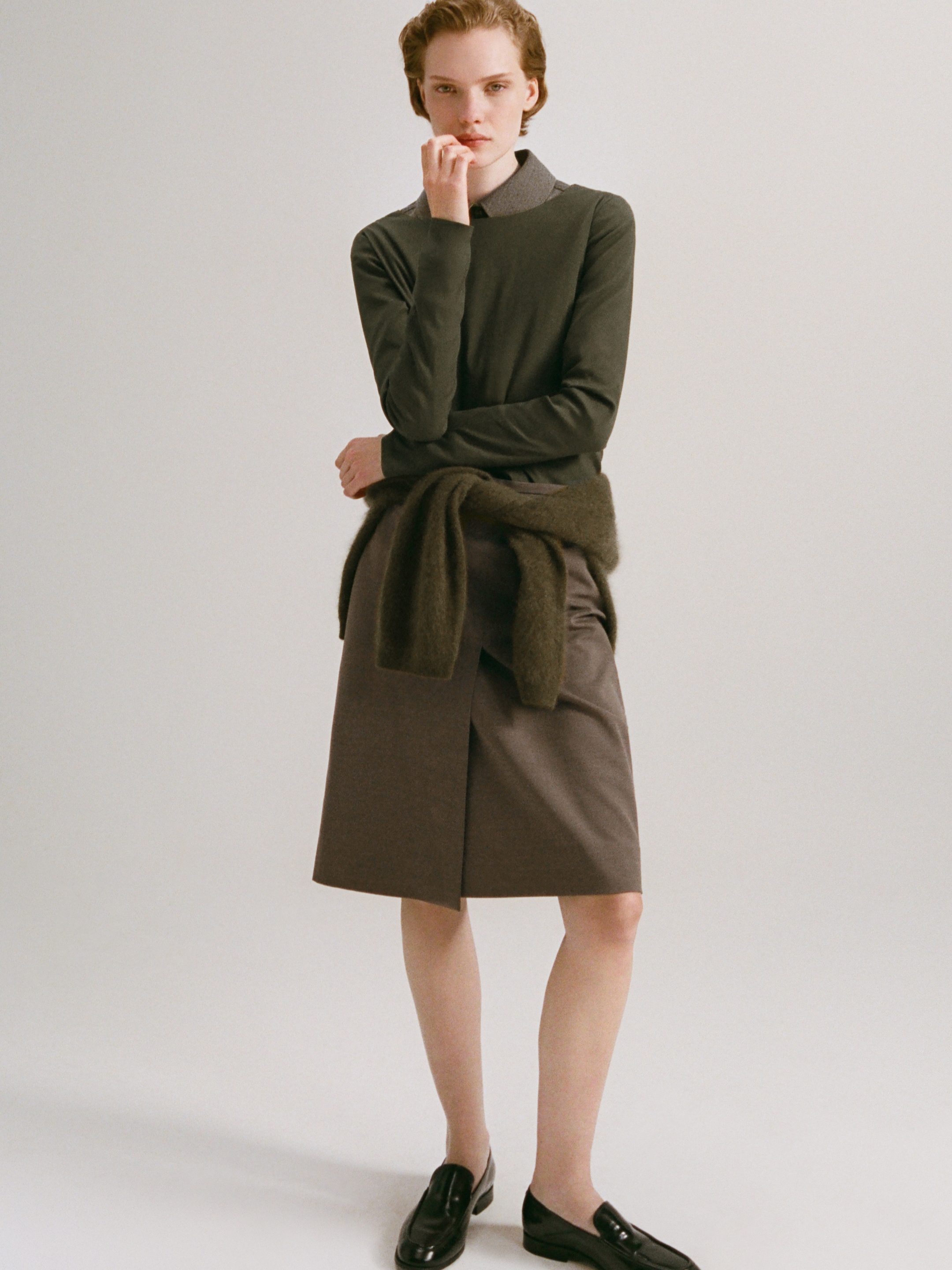 Women in wool top and skirt