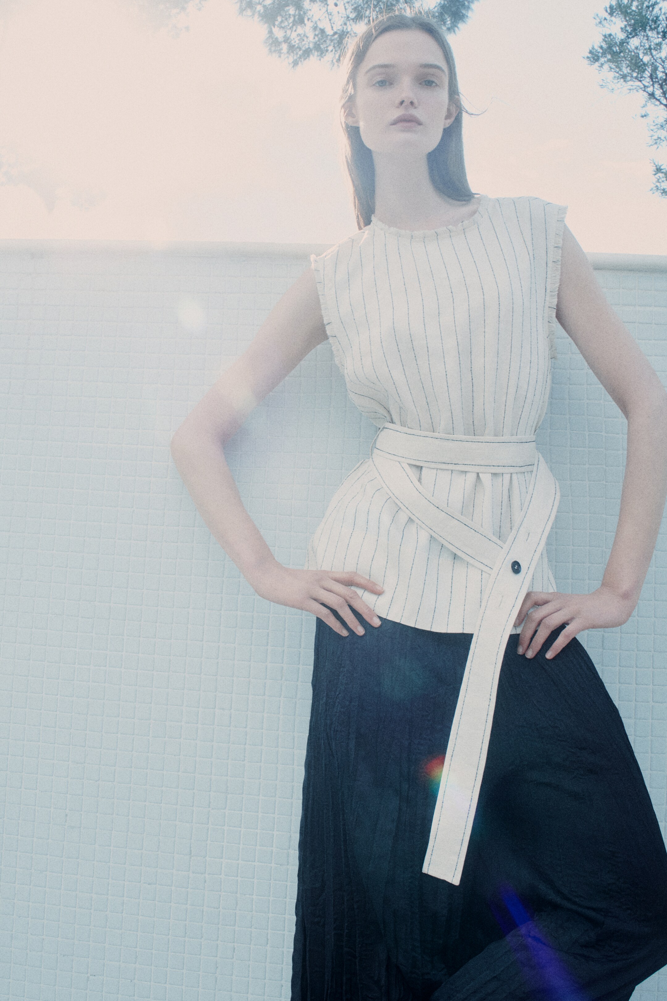 person wearing white top