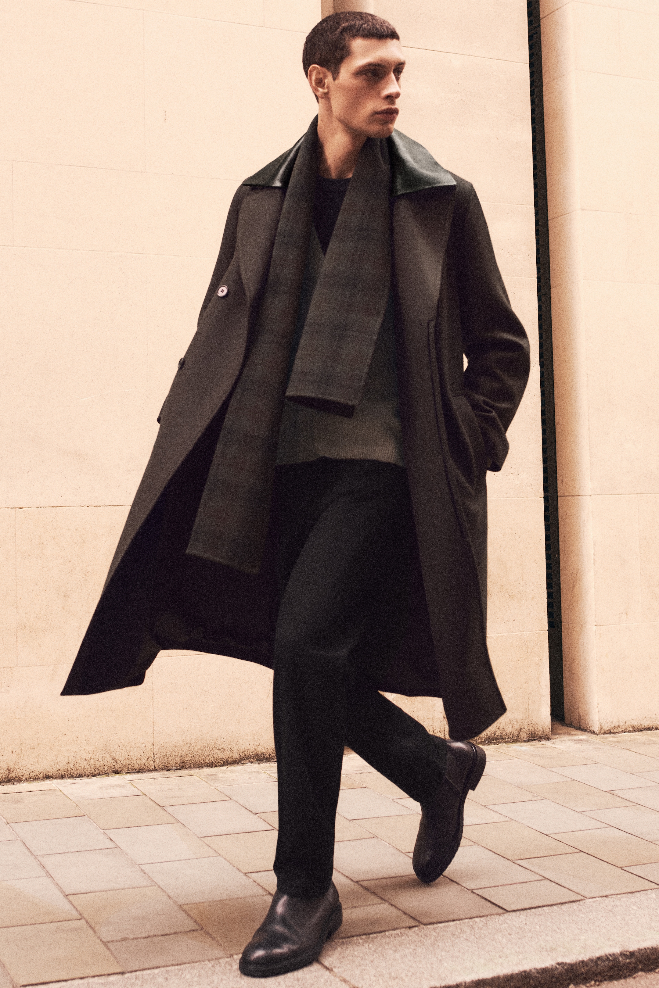 Man in coat and scarf