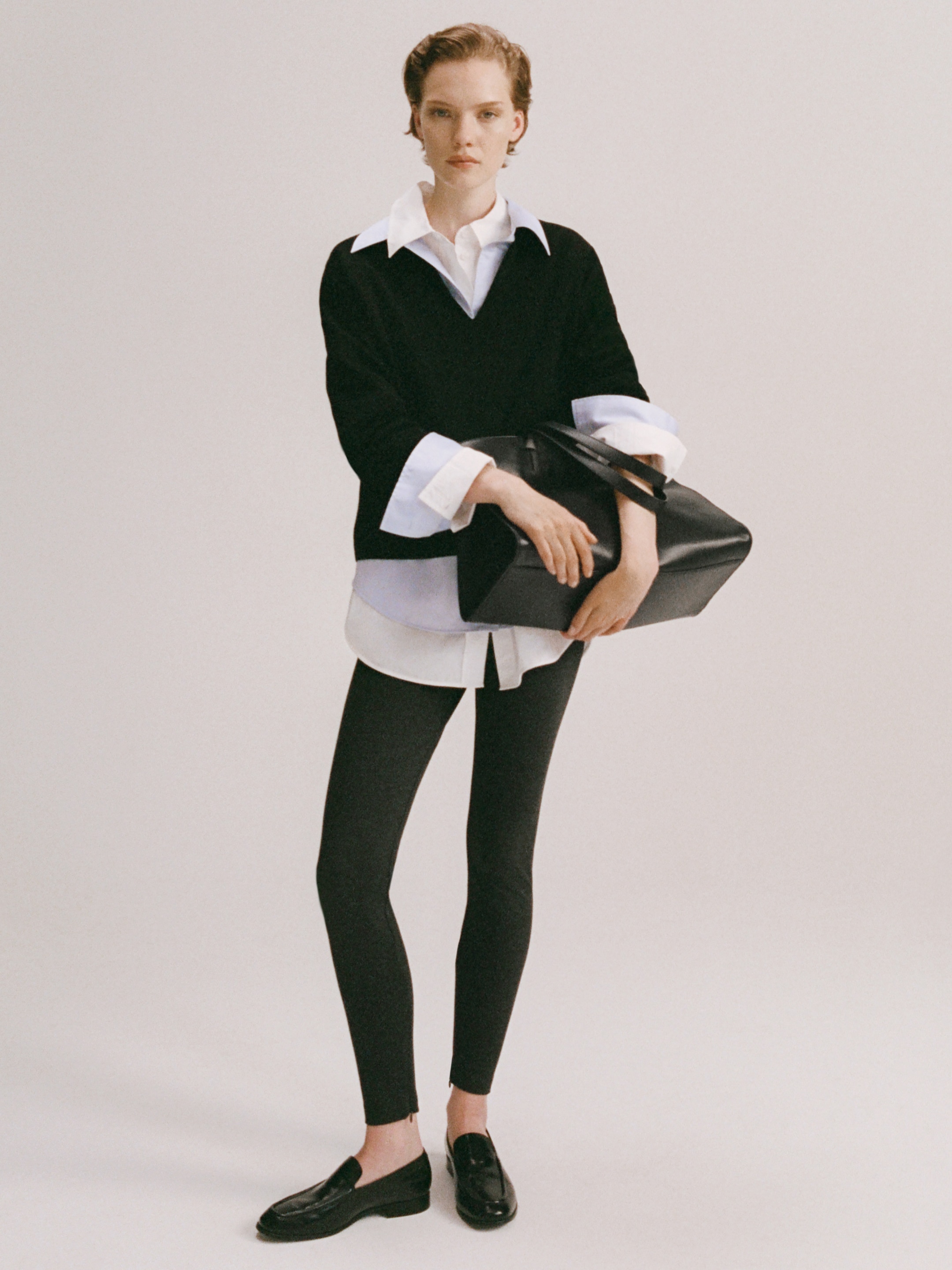 Women in white shirt and jumper