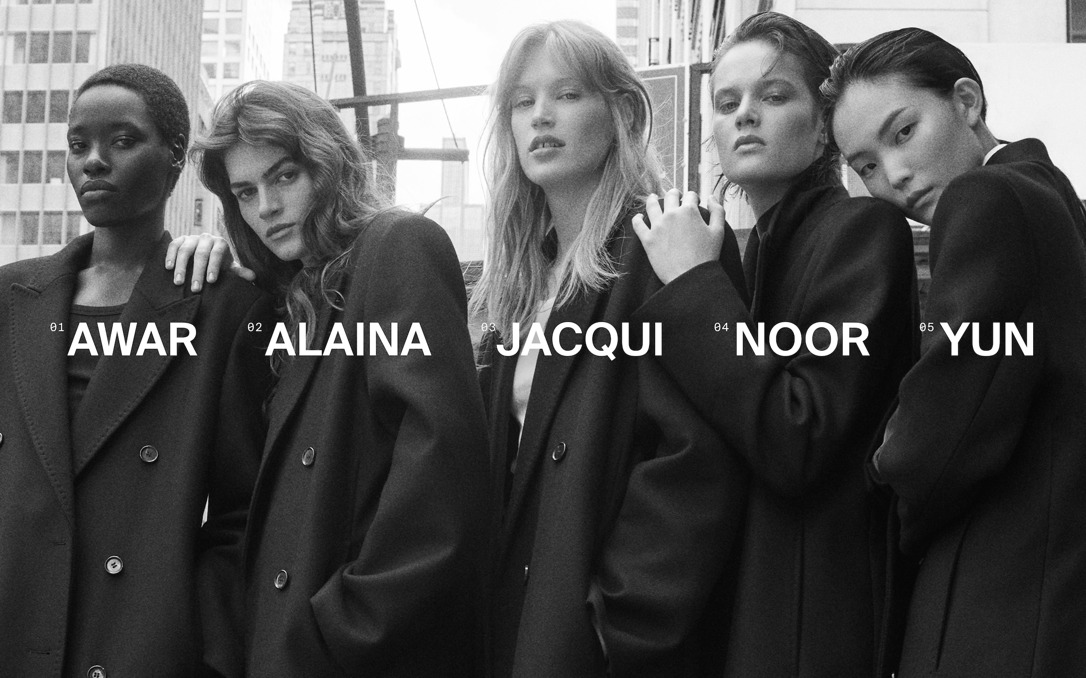 Five people wearing oversized dark coats, standing closely together in a black and white photo. Names are printed over each person.