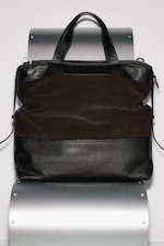 Placeholder for: Leather Bag with grey background