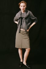 Placeholder for: Women in olive scarf to sweatshirt