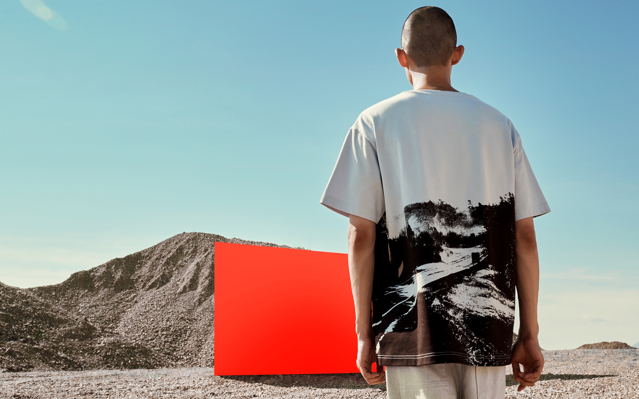 artist looking at painting