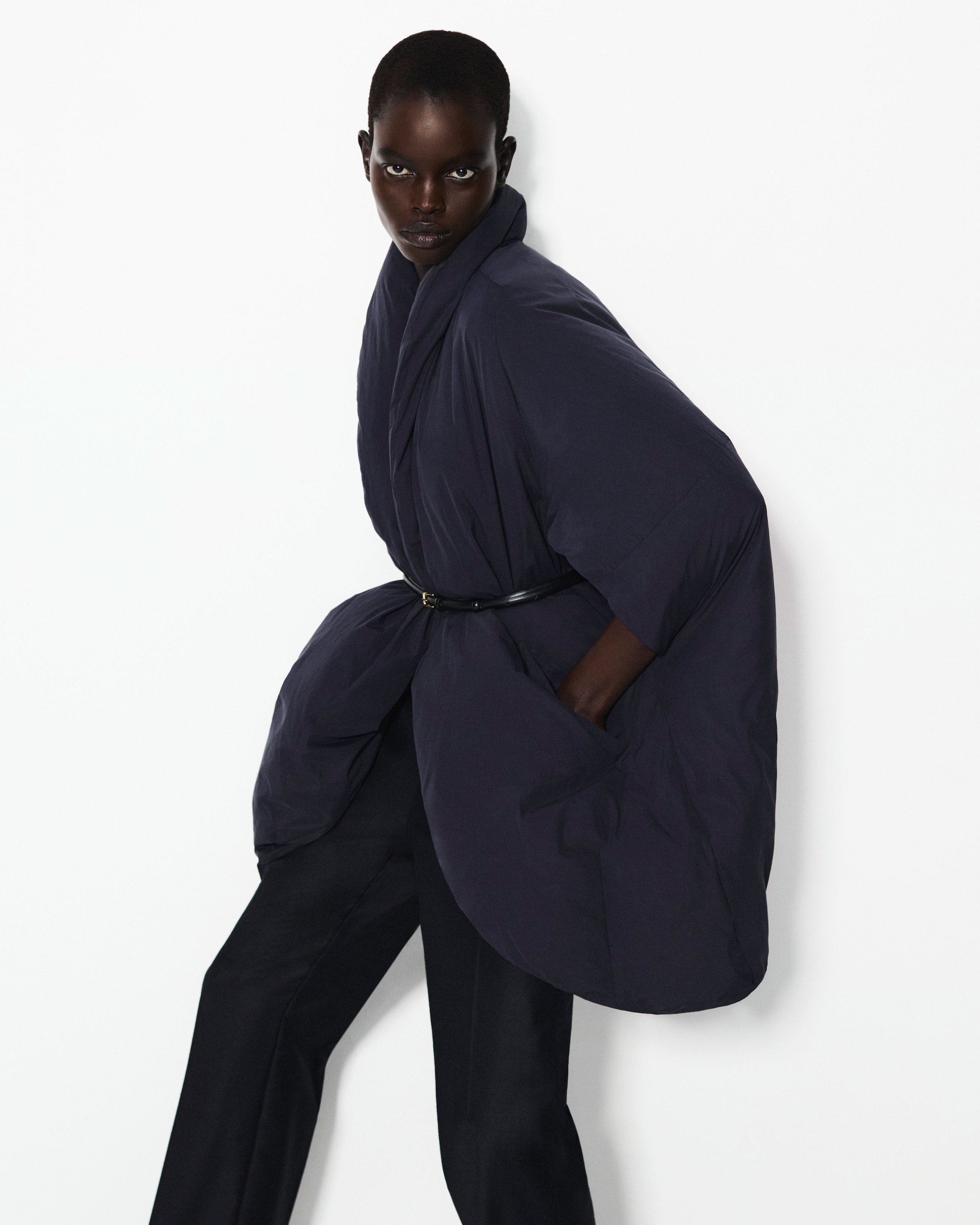 Person wearing navy jacket