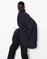 Placeholder for: Person wearing navy jacket