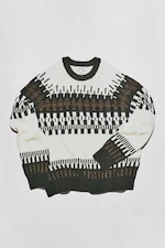 Placeholder for: Cream and black patterned knit sweater (COS) with geometric Fair Isle design, laid flat on white background.